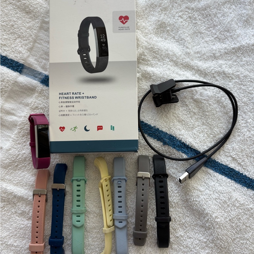 Fitbit Pink and Black Smartwatch with Health Monitoring